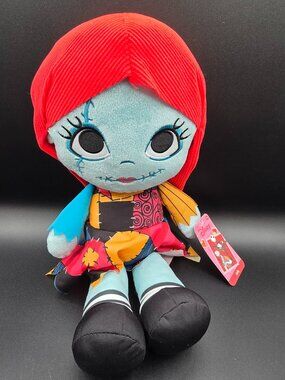 Details: Size: 15" plush Classic patchwork dress design Embroidered facial featu